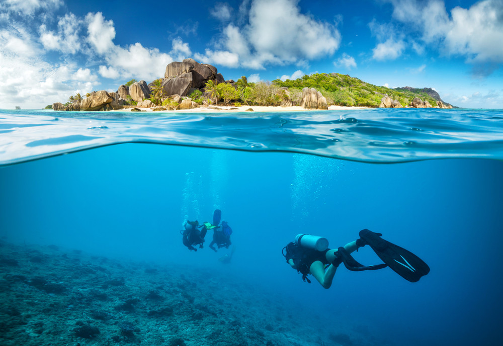 Divers exploring North Island, Seychelles.